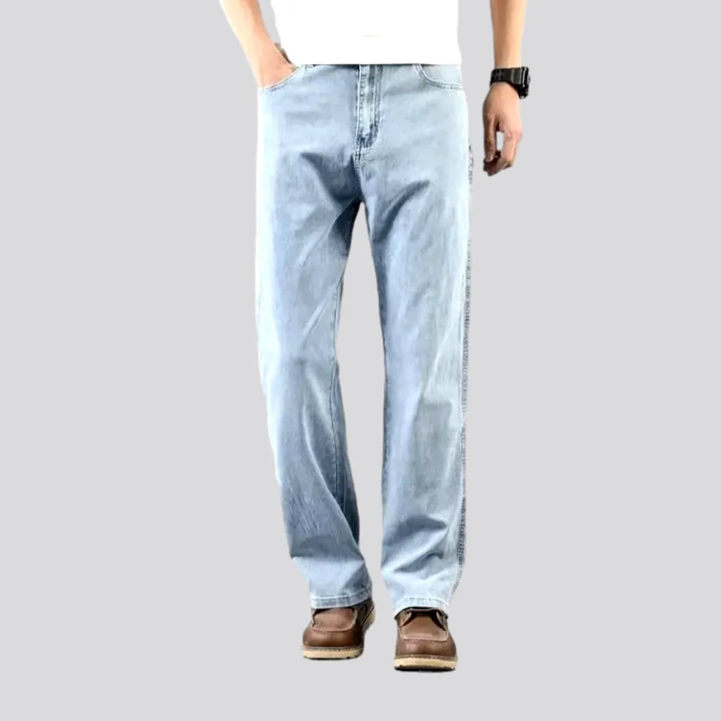 Thin men's whiskered jeans